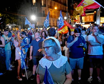 Caras largas, ayer por la noche en la sede del PP en la calle Génova de Madrid.