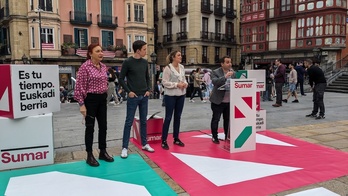 Muñoz, Errejón y García durante la intervención de Jiménez.